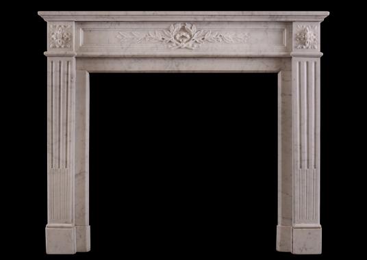 A Louis XVI style marble fireplace