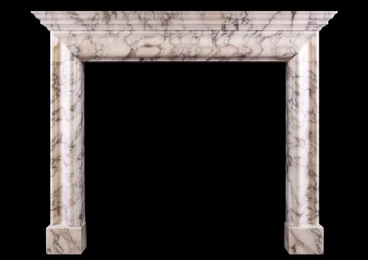 A bolection fireplace with moulded shelf