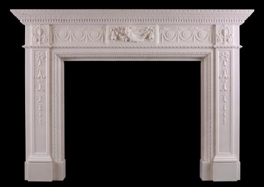 A FINELY CARVED MARBLE FIREPLACE