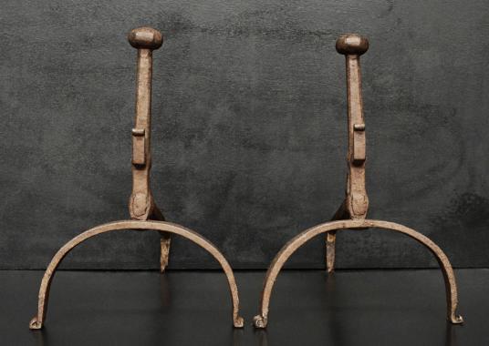 A pair of antique firedogs