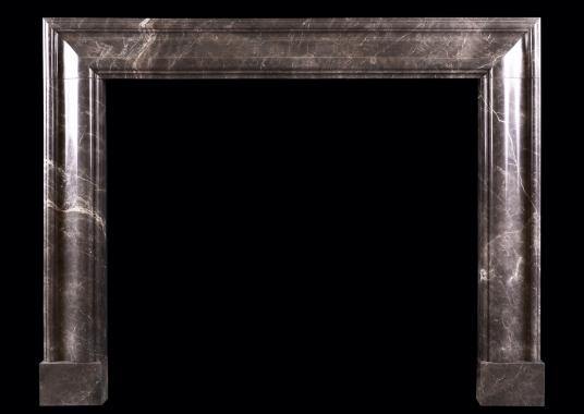 A bolection fireplace in Elegant Grey marble