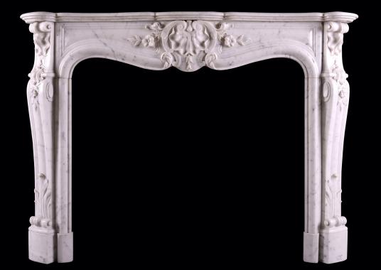 A French marble fireplace in the Louis XV manner