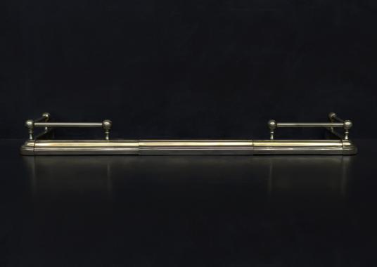 An English brass fender