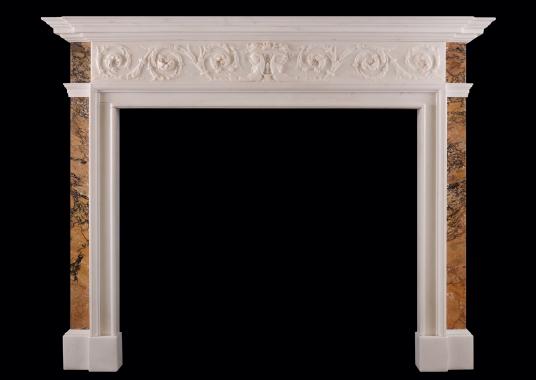 A Statuary marble fireplace with Italian Sienna marble inlay
