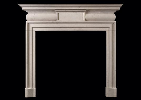 A Georgian style limestone fireplace