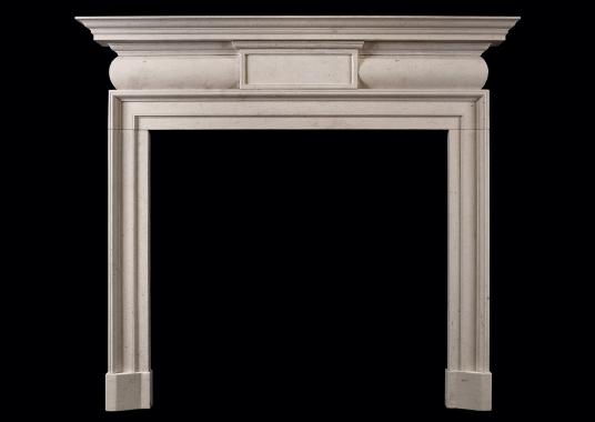 A Georgian style limestone fireplace