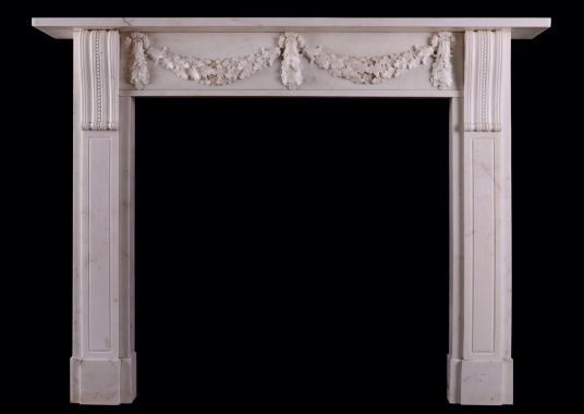 A late Regency Statuary white marble fireplace