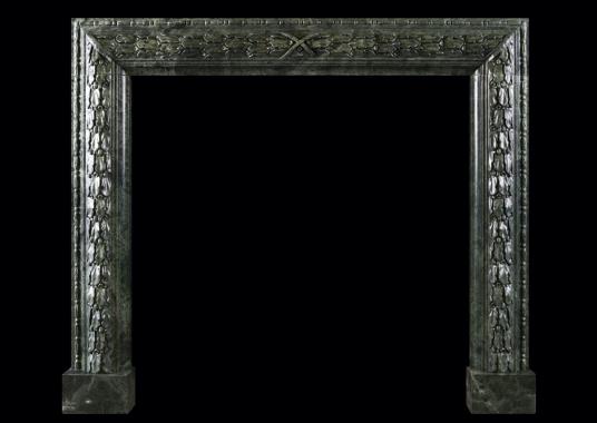 AN ELEGANT CARVED BOLECTION FIREPLACE