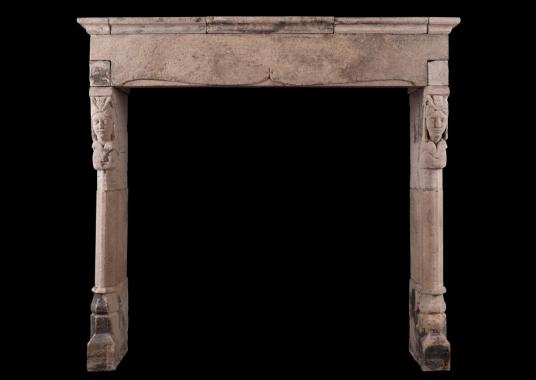A mid-scale English stone fireplace in the Gothic manner