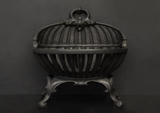 A Regency style cast iron firegrate