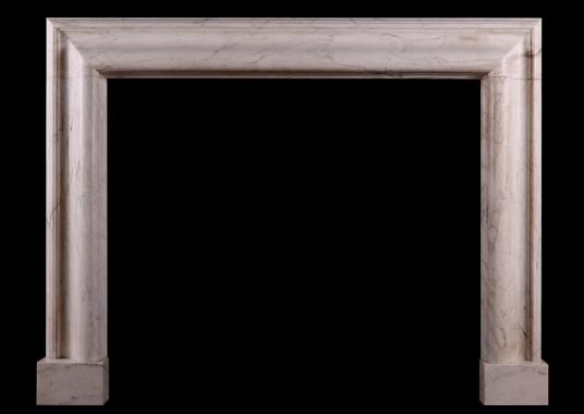 An English Statuary marble bolection fireplace