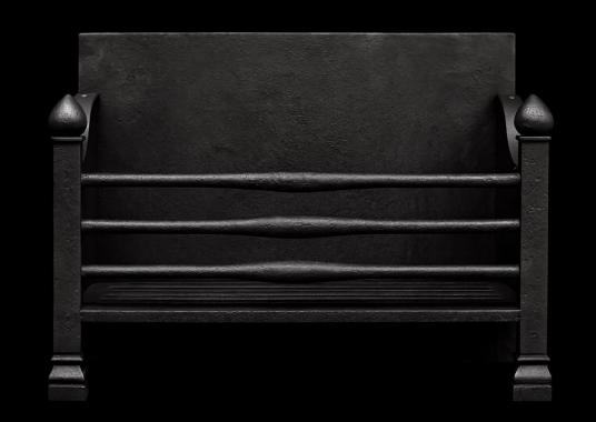 A cast iron firegrate in black lead finish