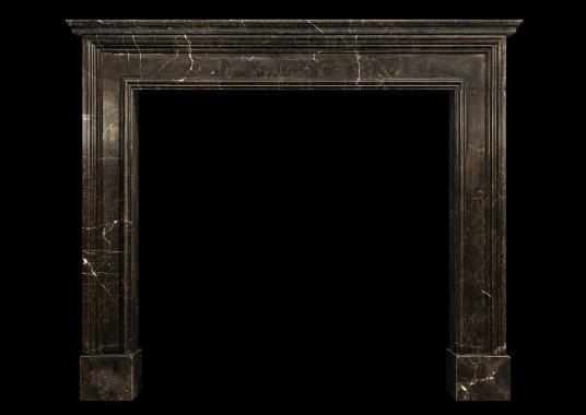 An architectural fireplace in Dark Emperador marble