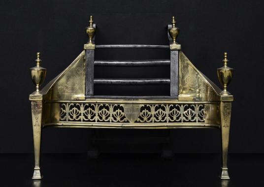 An English brass and steel firegrate with Anthemion motif