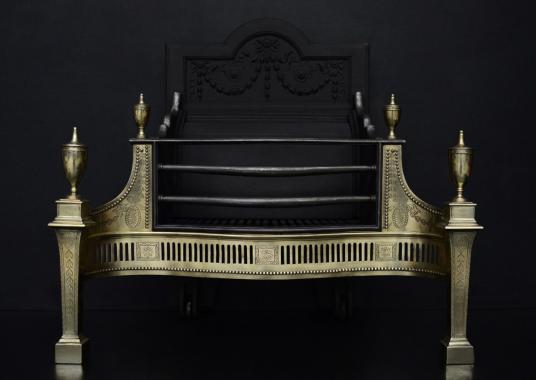 A brass and steel firegrate in the Georgian manner