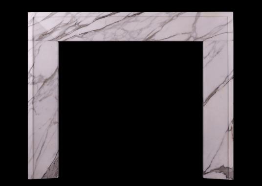 An architectural English marble fireplace in Calacatta marble
