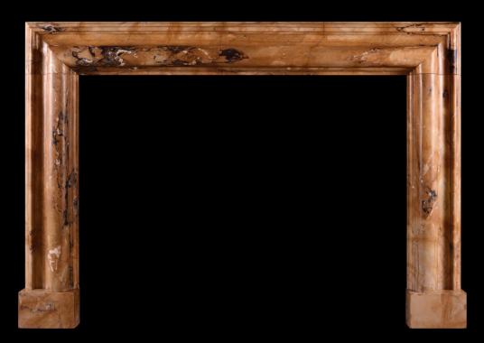 A very fine quality Italian Siena marble bolection fireplace