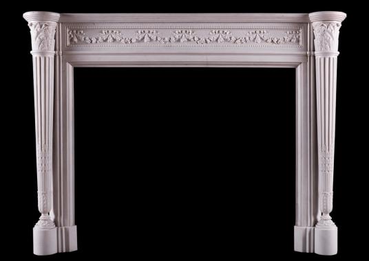 A French Louis XVI style fireplace in Statuary white marble