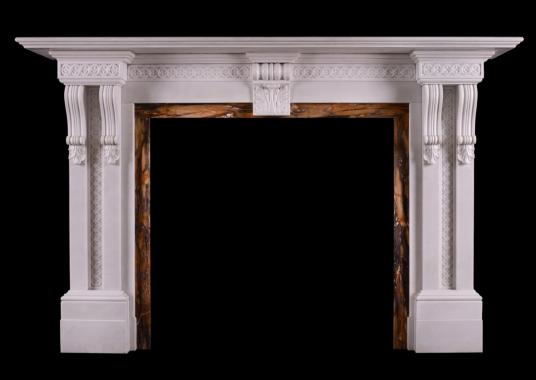 A Victorian fireplace in white marble