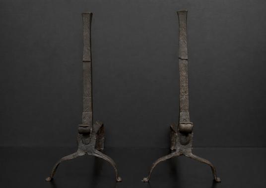 A rustic pair of English firedogs