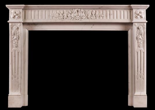 A Statuary marble fireplace in the Louis XVI style