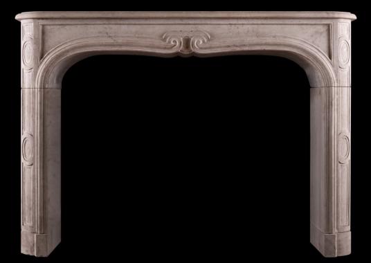 A French limestone transitional Louis XIV/XV fireplace