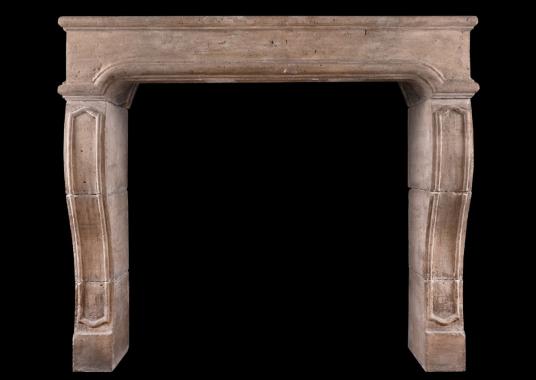 A period French Louis XIV limestone fireplace