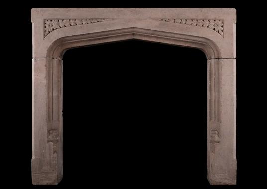 An English stone fireplace in the Gothic style
