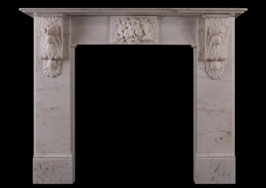 A finely carved period Victorian white marble fireplace