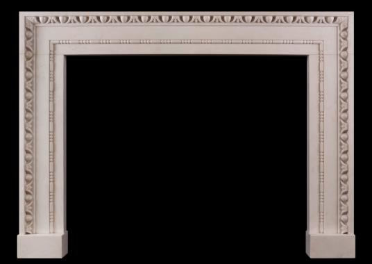 A white marble fireplace in the architectural style
