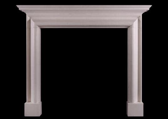 An architectural white marble fireplace