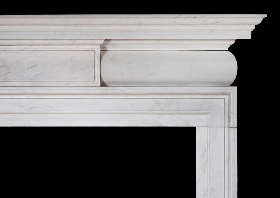 A white marble chimneypiece in the mid Georgian style