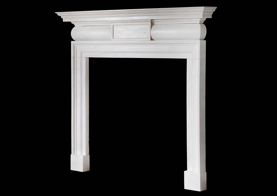 A white marble chimneypiece in the mid Georgian style