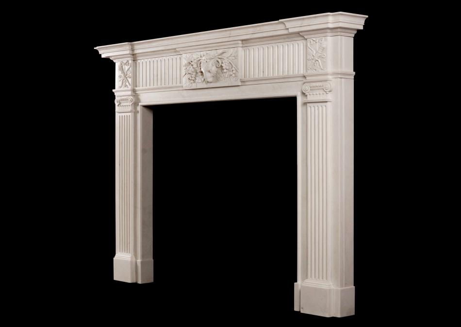 A Georgian Style White Marble Chimneypiece with Rams head to centre plaque