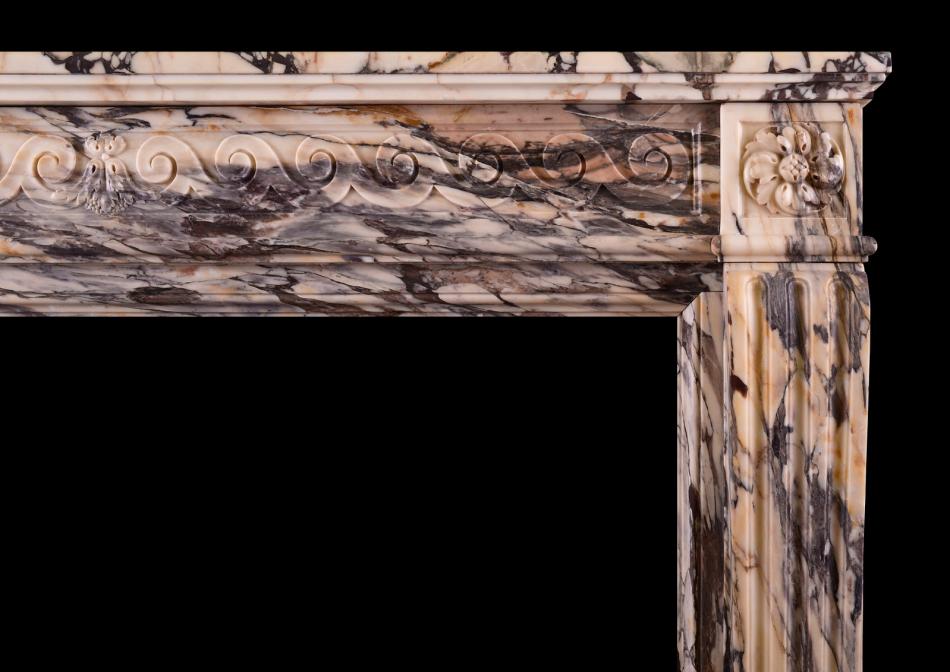 An 18th century Louis XVI fireplace in Breccia Violette marble
