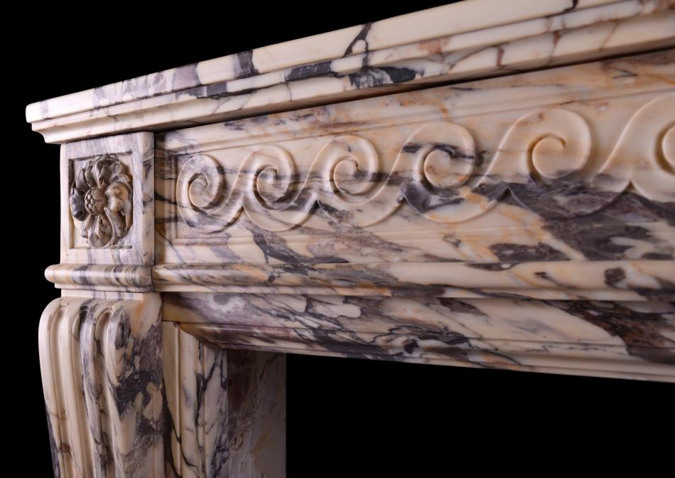 An 18th century Louis XVI fireplace in Breccia Violette marble