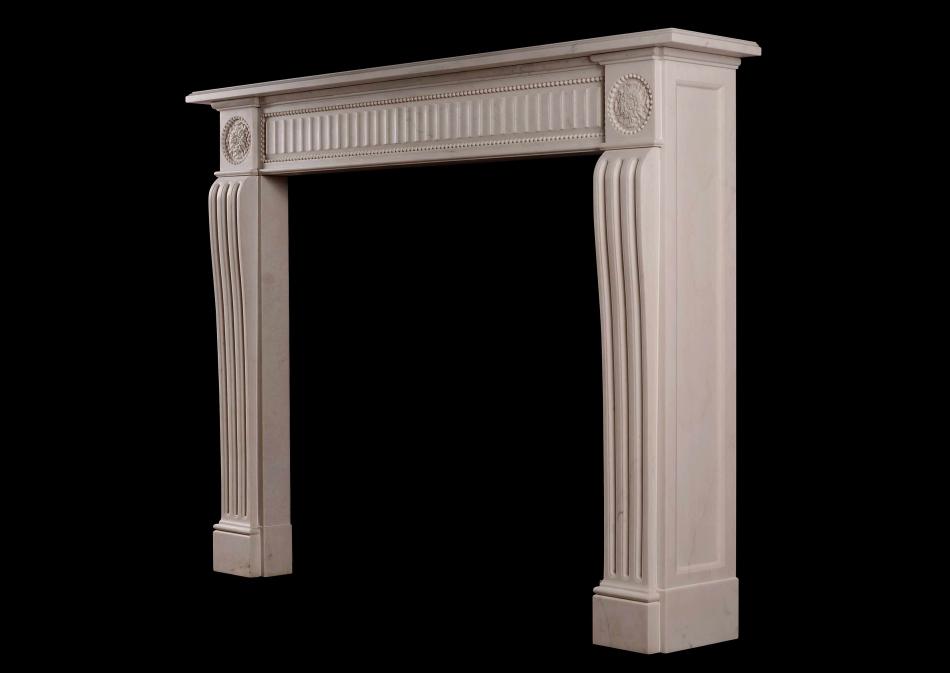An English white marble fireplace in the Regency style