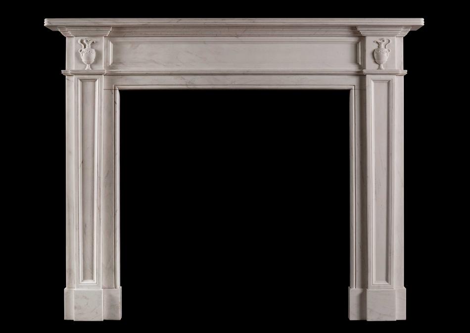 A Regency style white marble fireplace