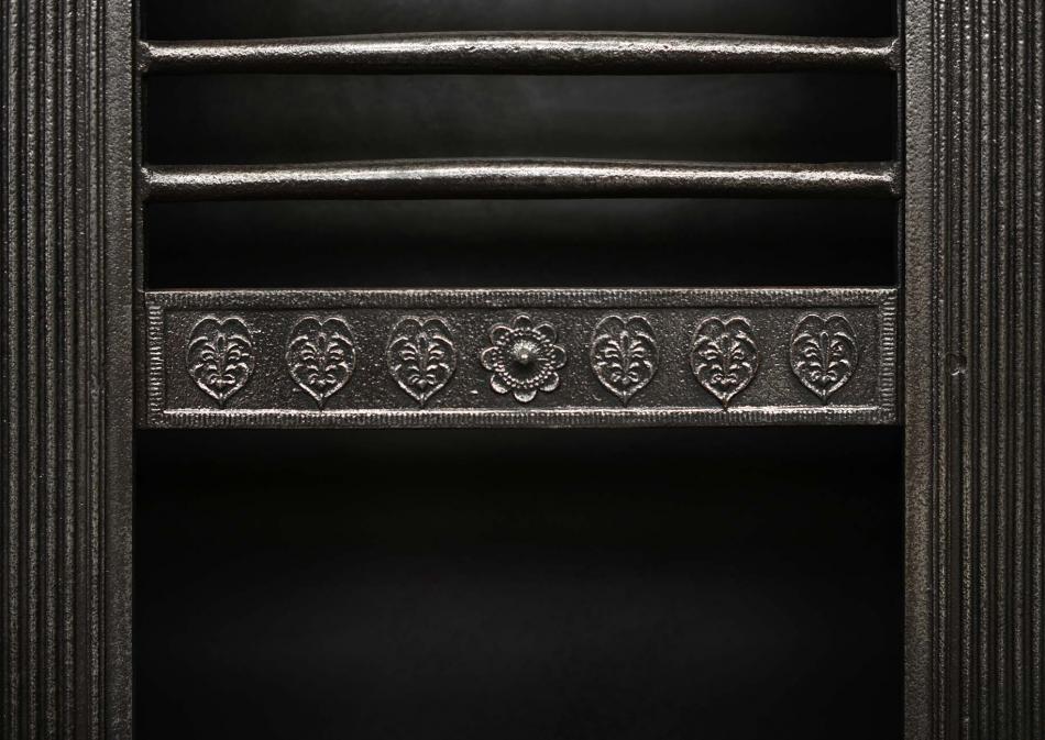 A late Georgian style cast iron register grate