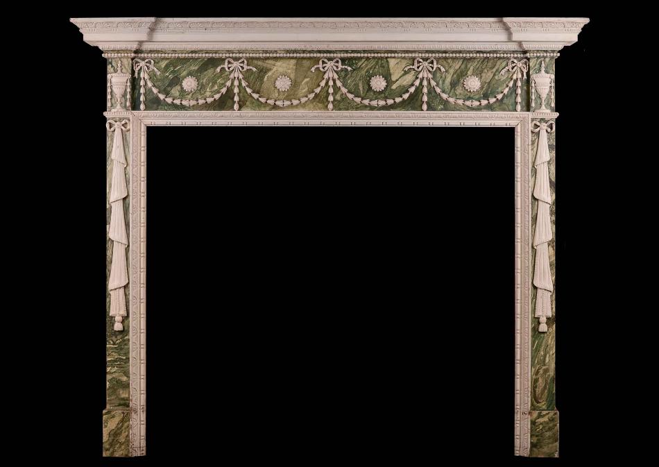 A faux marble Adam style wood fireplace with gesso enrichments