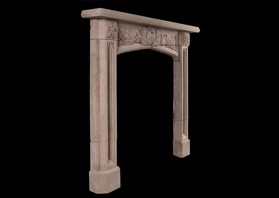 A well carved English, Gothic Revival Bath stone fireplace