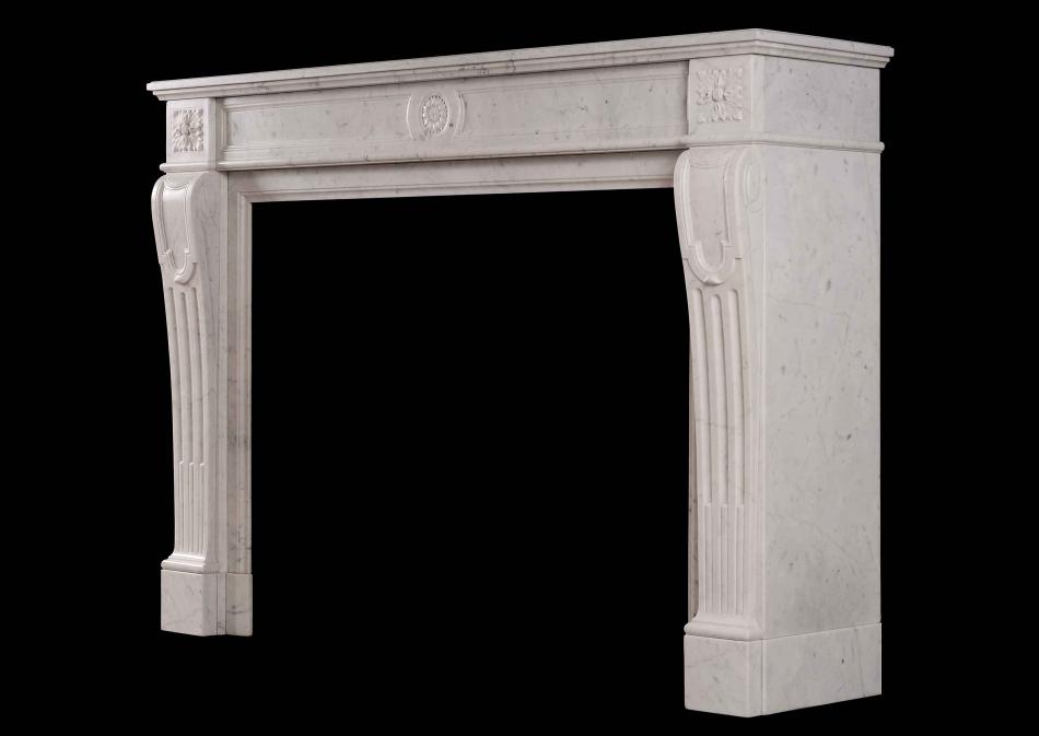A 19th century French Carrara antique marble fireplace in the Louis XVI style