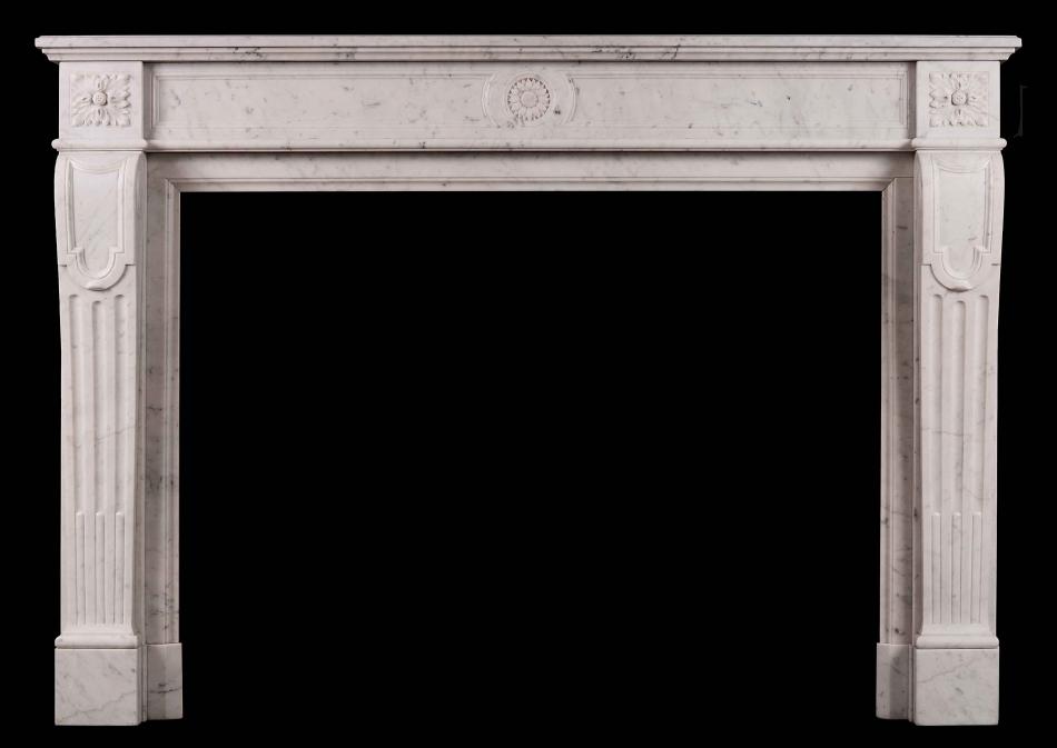 A 19th century French Carrara antique marble fireplace in the Louis XVI style