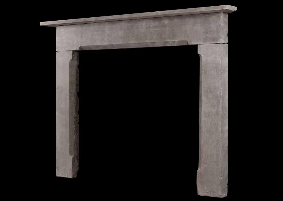 A large English fireplace in grey York stone