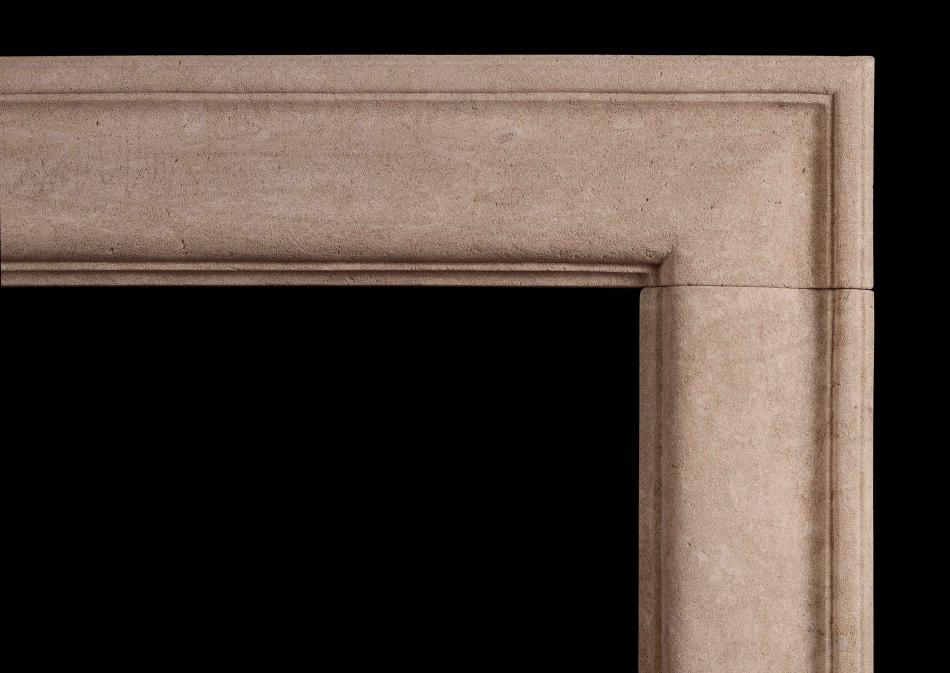 An English moulded bolection fireplace in Bath stone