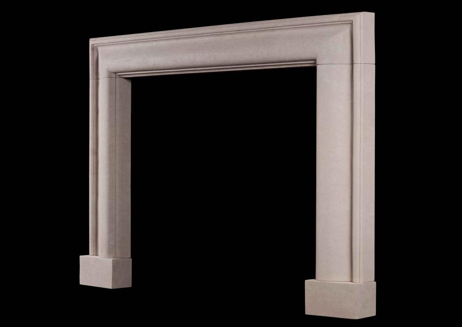 An English moulded bolection fireplace in Portland stone
