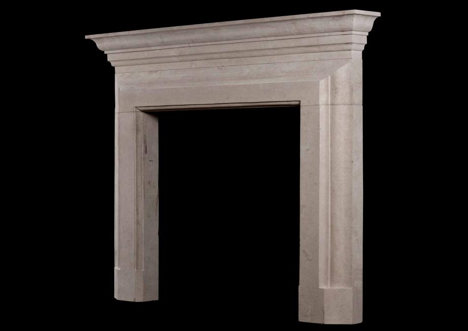 An English limestone fireplace of architectural form