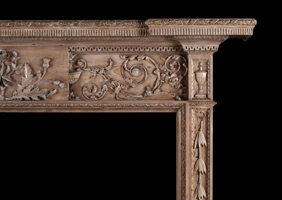A fine quality 18th century carved pine fireplace