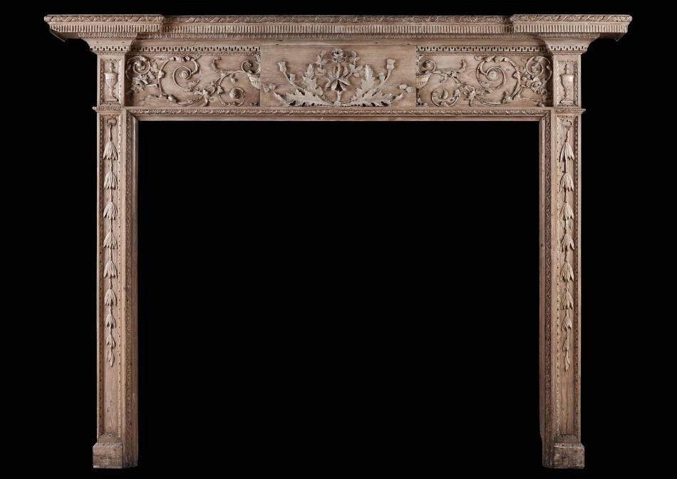 A fine quality 18th century carved pine fireplace