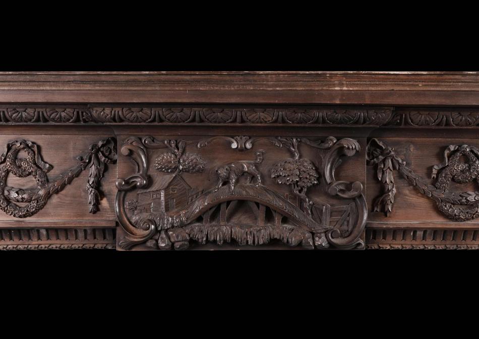 An early 19th century pine fireplace featuring Aesop's Fable